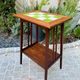 Art Nouveau side table 1910 with double tops in dark oak.