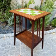 Art Nouveau side table 1910 with double tops in dark oak.