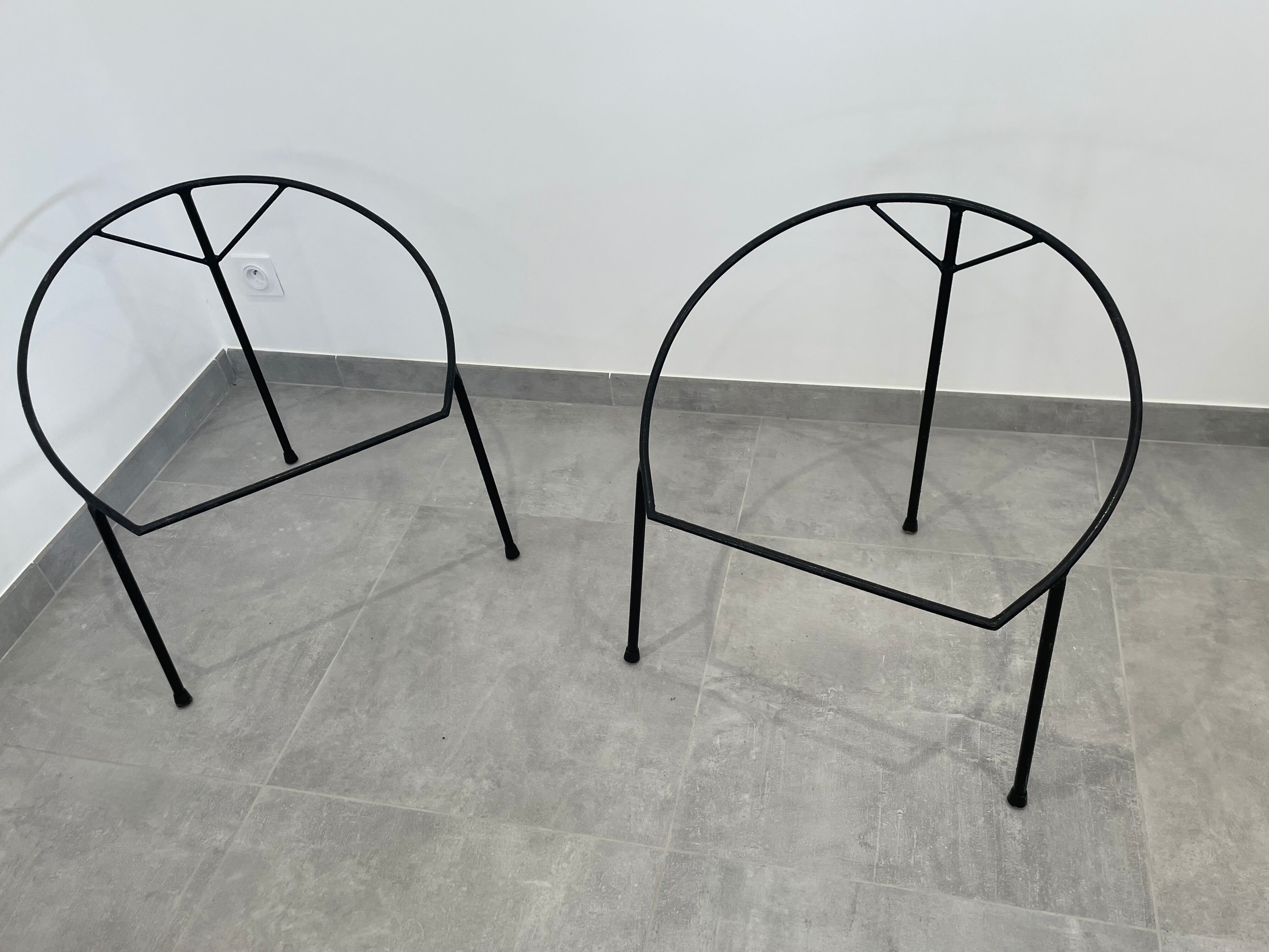 Pair of rattan and black metal armchairs, 1950s/60s