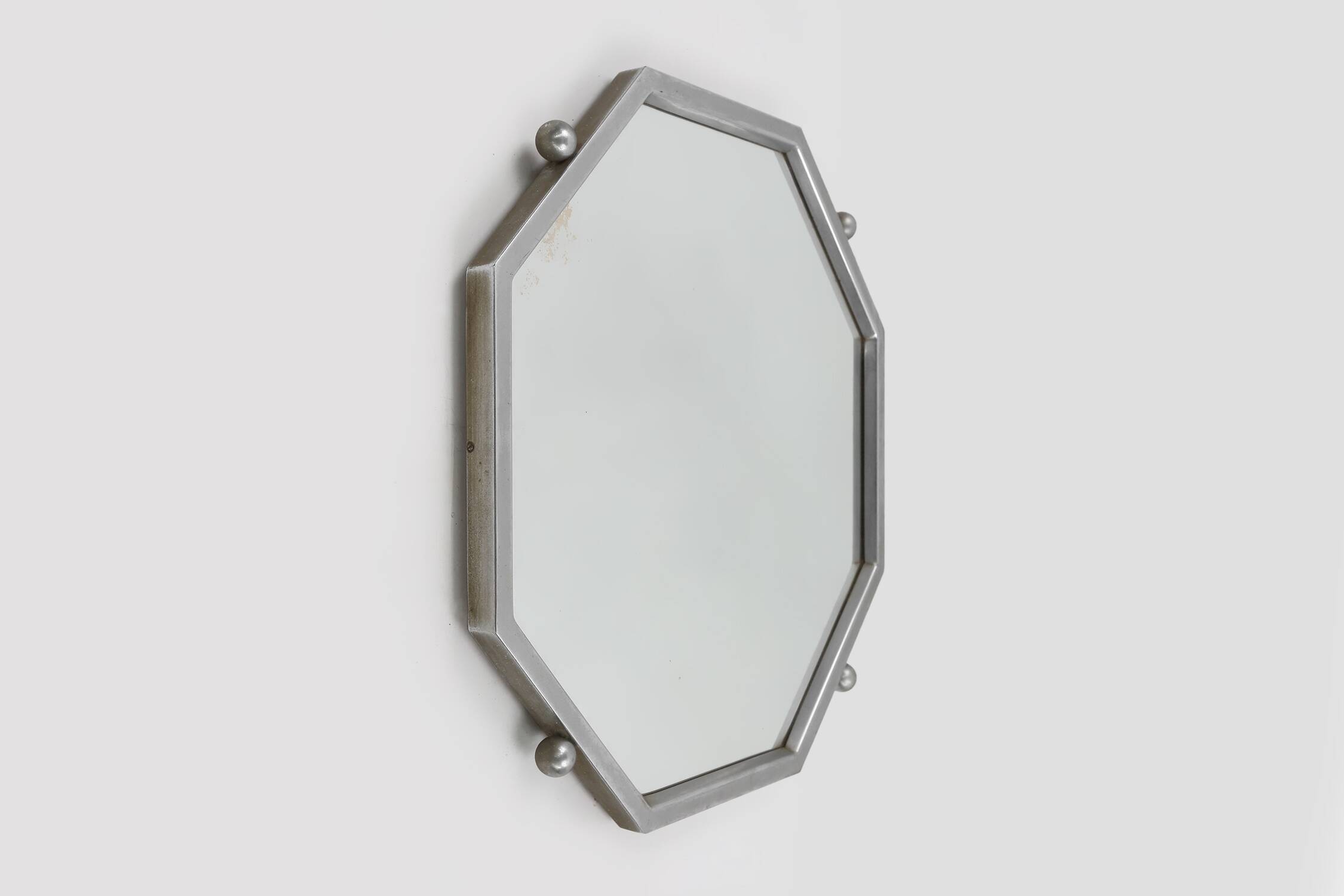 Art Deco octangular mirror in nickeled copper, France ca. 1920