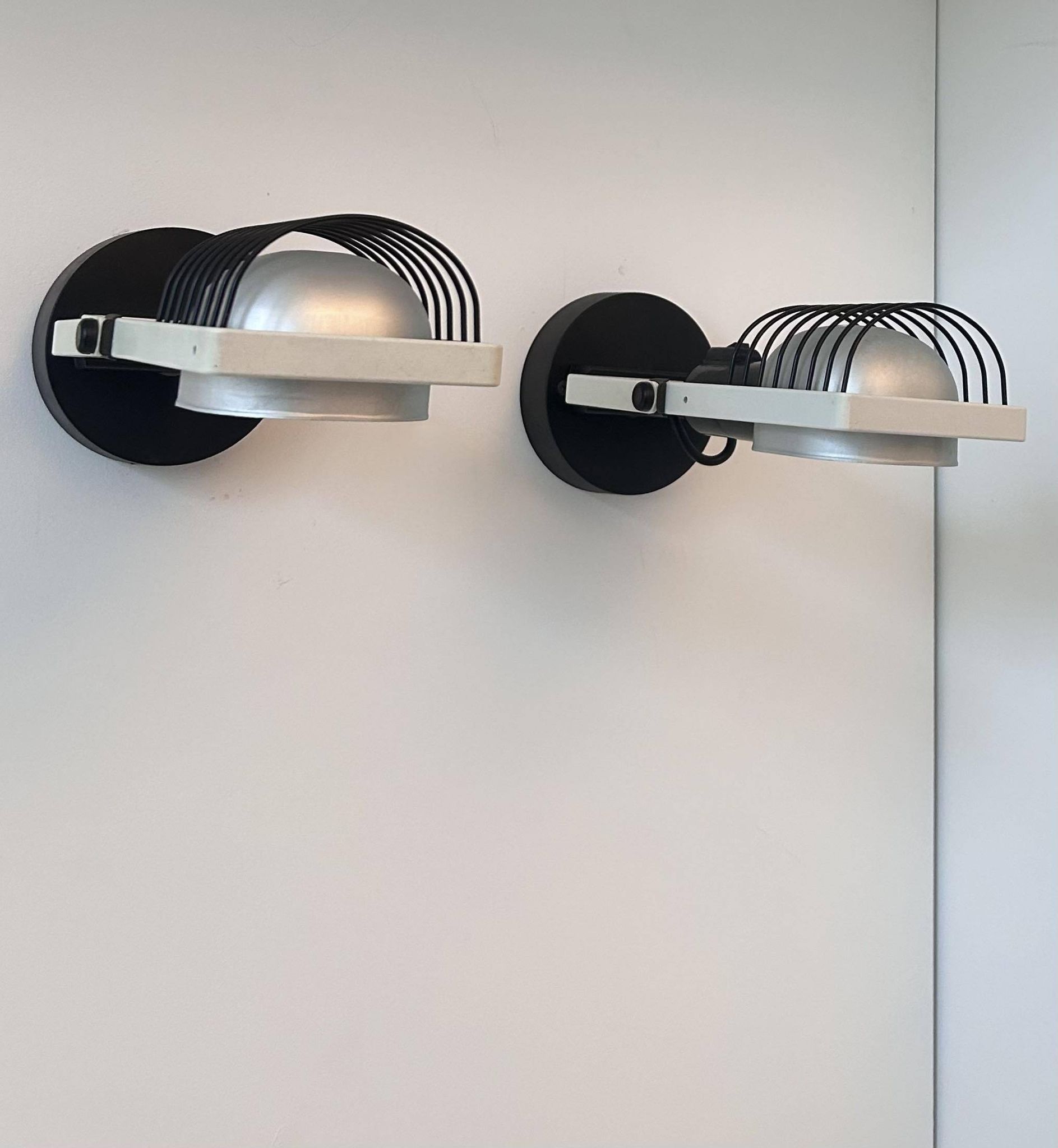 Pair of vintage Sintesi adjustable wall lights, by Gismonti for Artemide, Italy 1975
