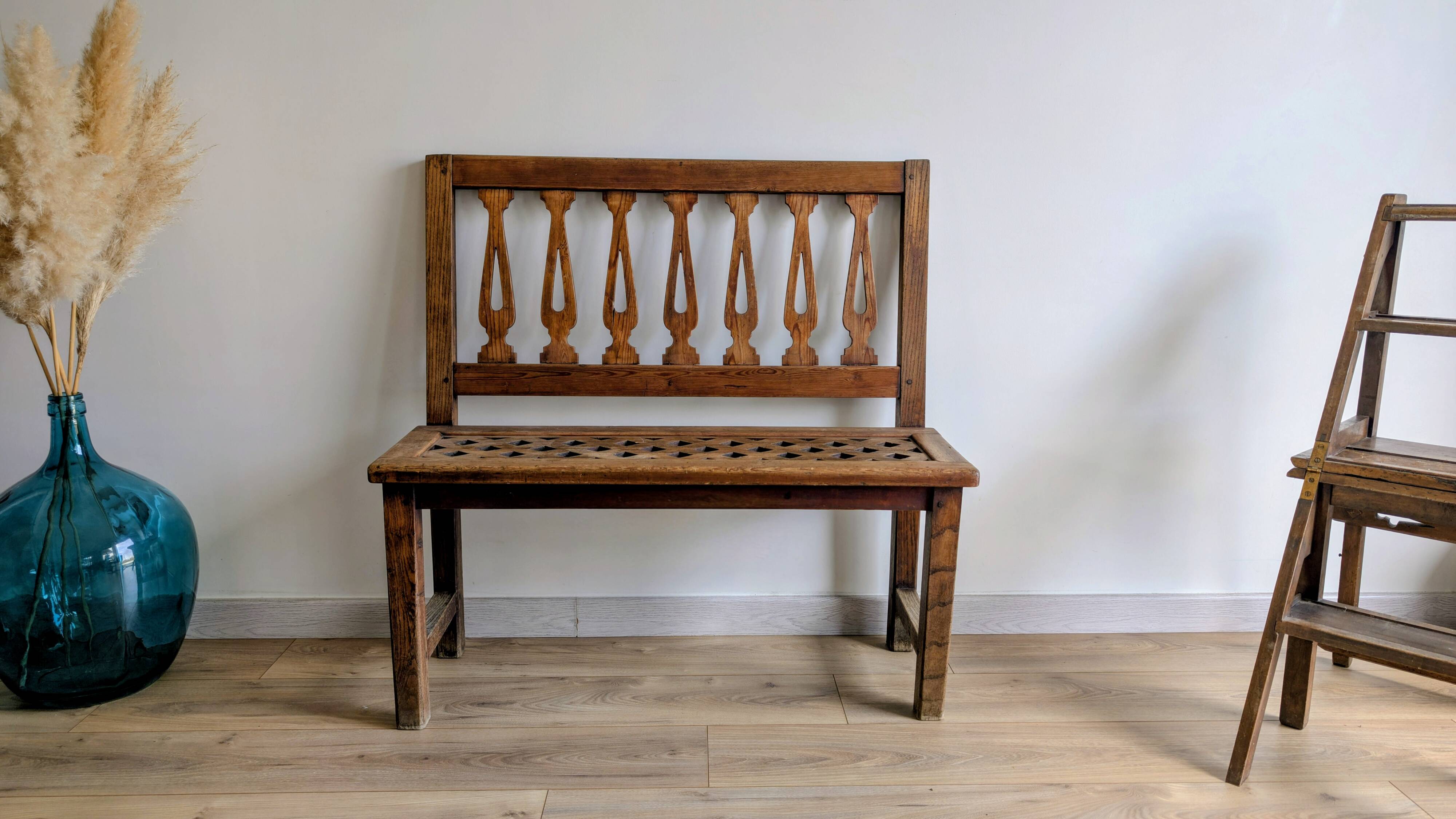 Old church bench in pitch pine, rustic charm and authentic patina.