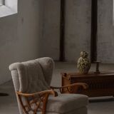 Pair of modern Swedish lounge chairs, shearling sheepskin and elm, 1940s.