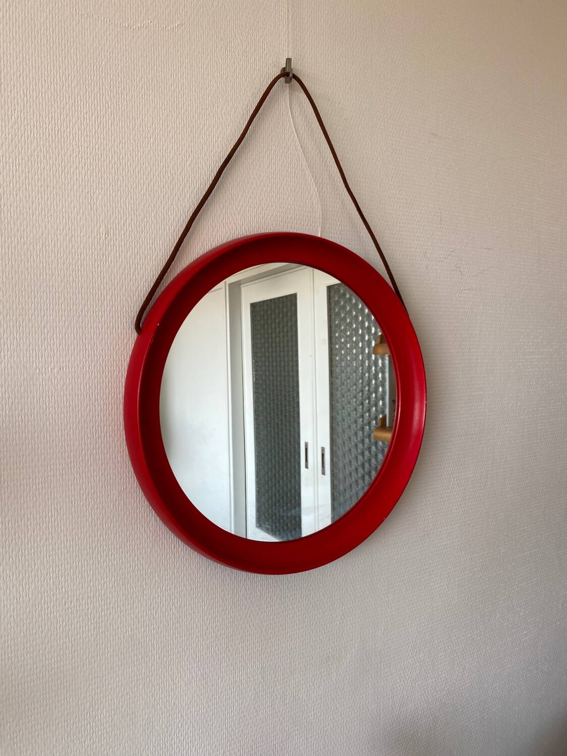 Mid-Century Scandinavian Red Round Wooden Mirror with Leather Strap, 1950s