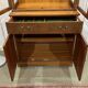 English display cabinet with two sections made of yew from the 1980s.