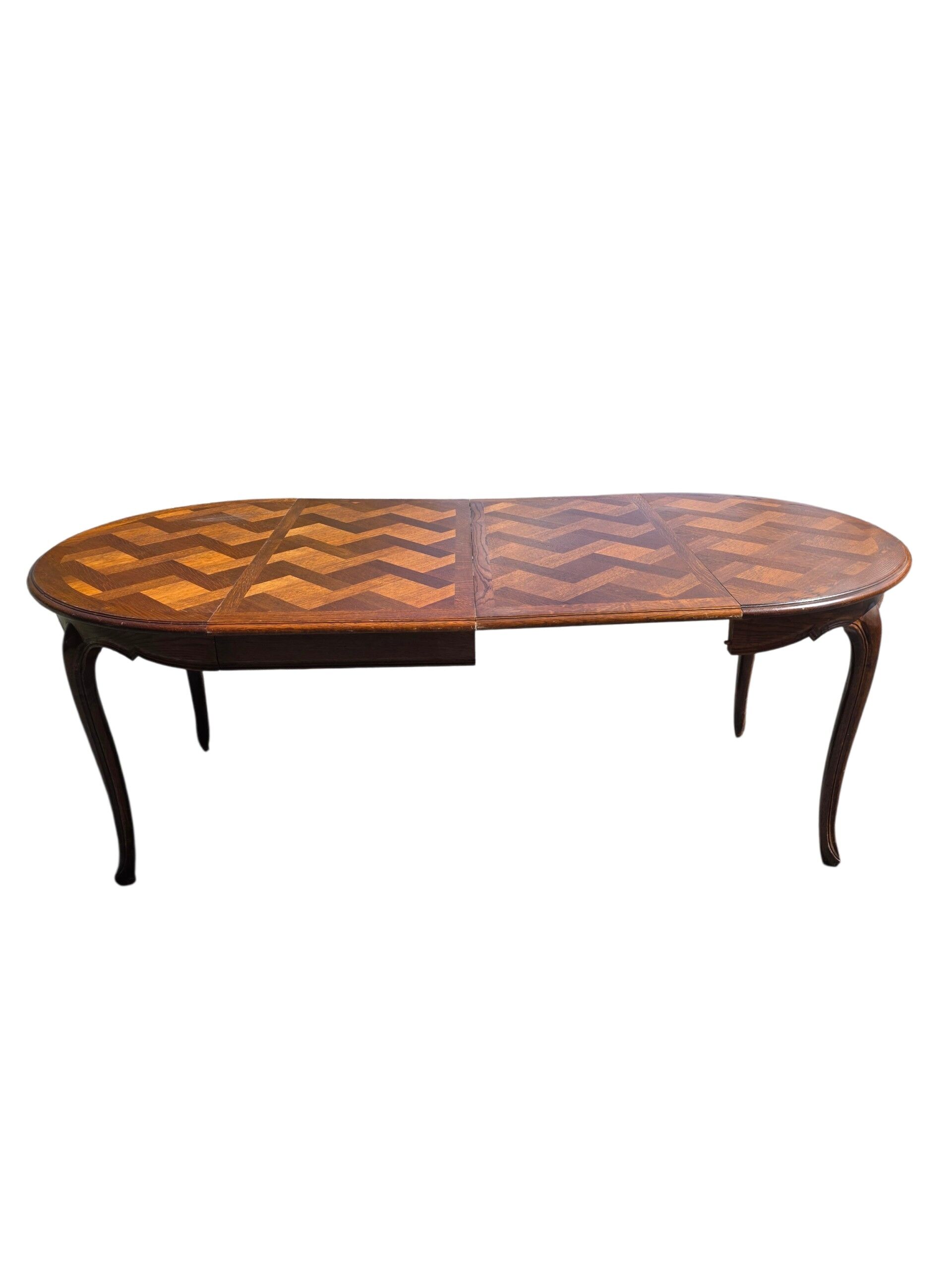Extendable table in Louis XV style in oak (2 extensions)