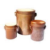 Trio of stoneware pots with lids