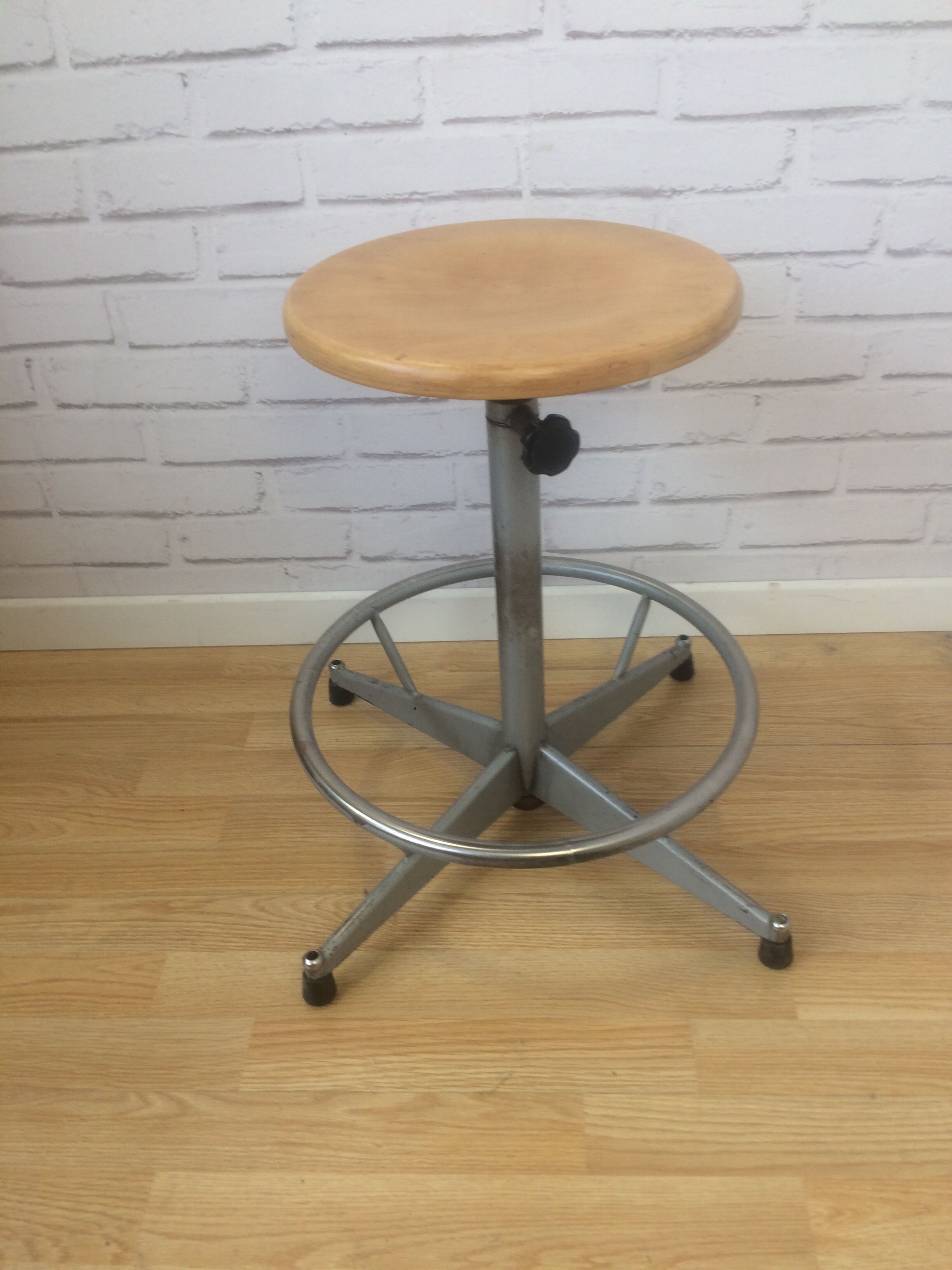 Industrial stool adjusted height