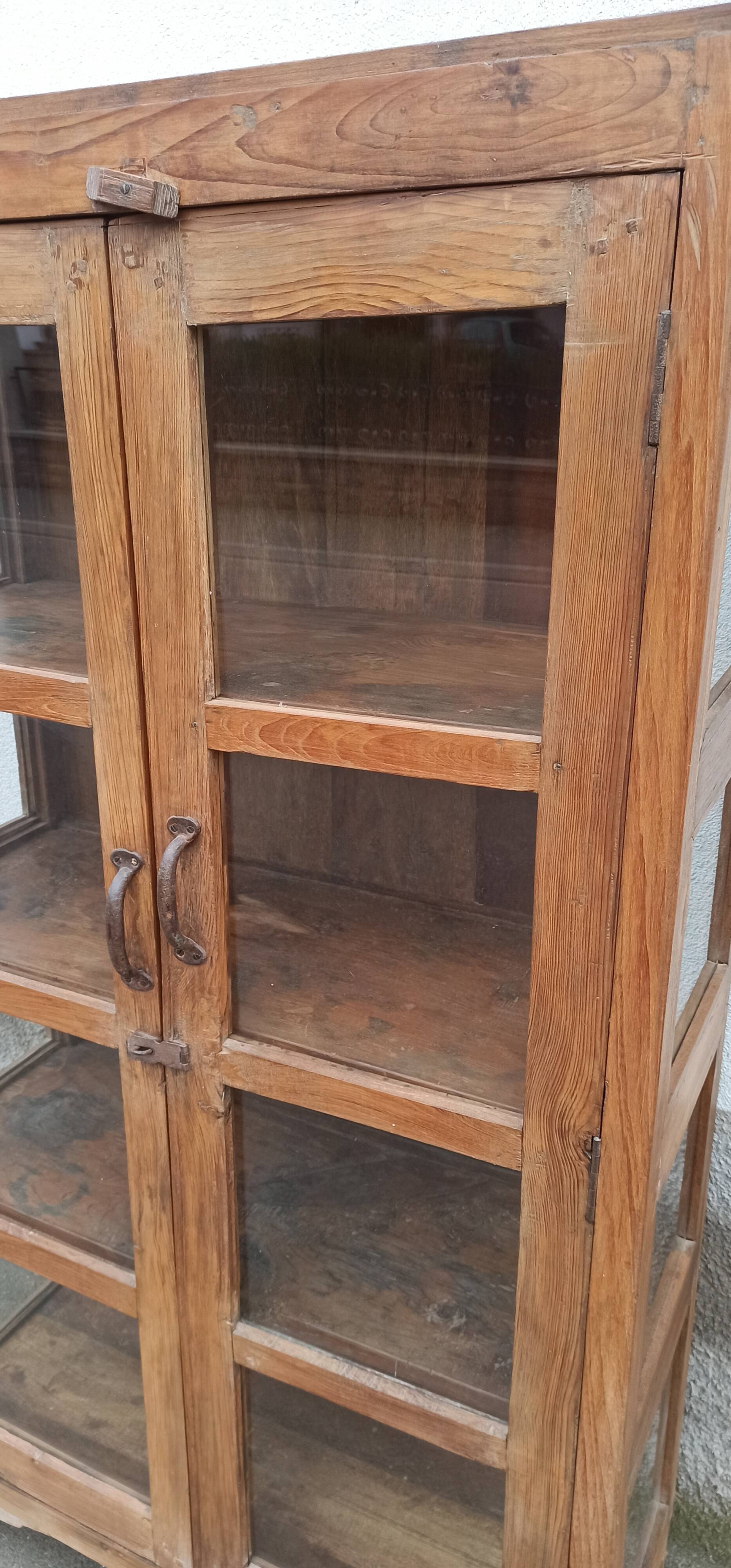 Old wooden cabinet display case with two doors
