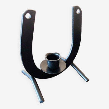 Horseshoe shaped candle holder in black wrought iron