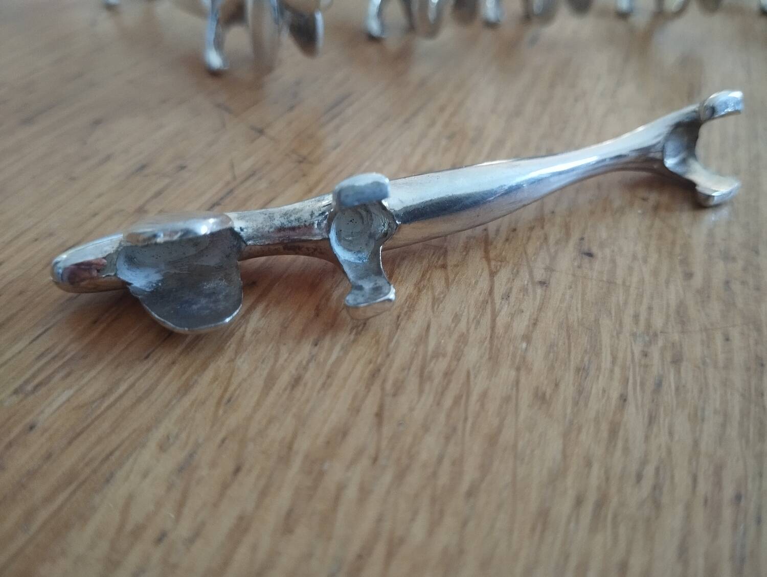 Silver metal dog knife holder