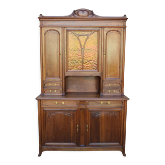 Art Nouveau two-body sideboard in carved walnut, circa 1900