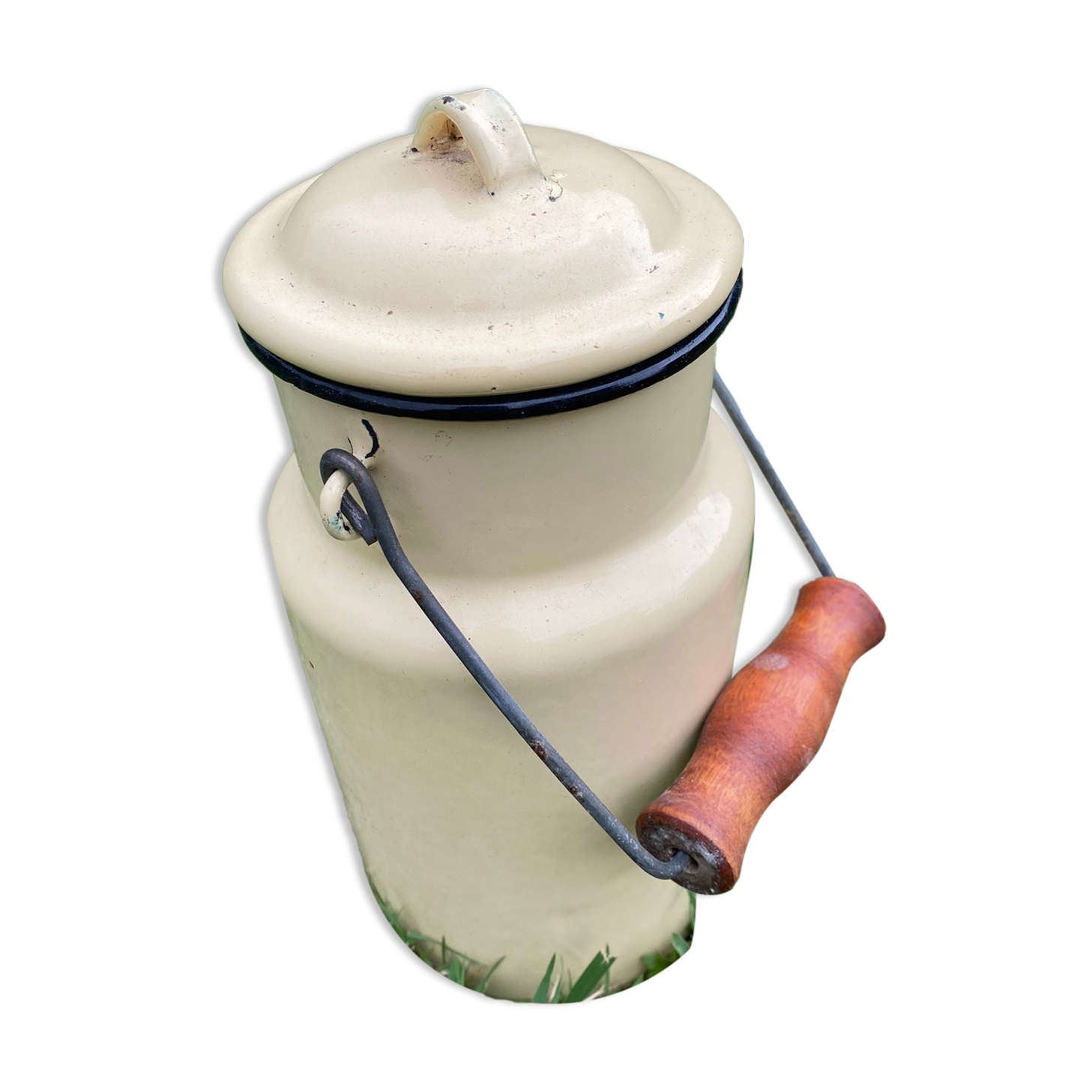 Old milk pot in enamelled sheet metal