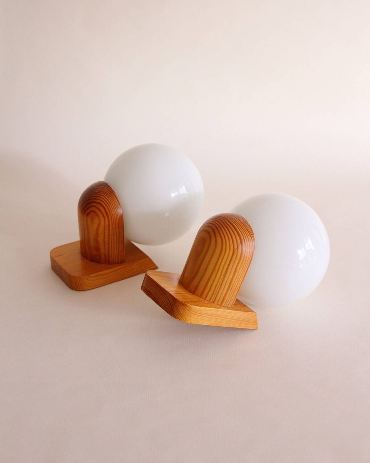Pair of wall lights in pine and opaline, 1960s.