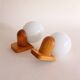 Pair of wall lights in pine and opaline, 1960s.