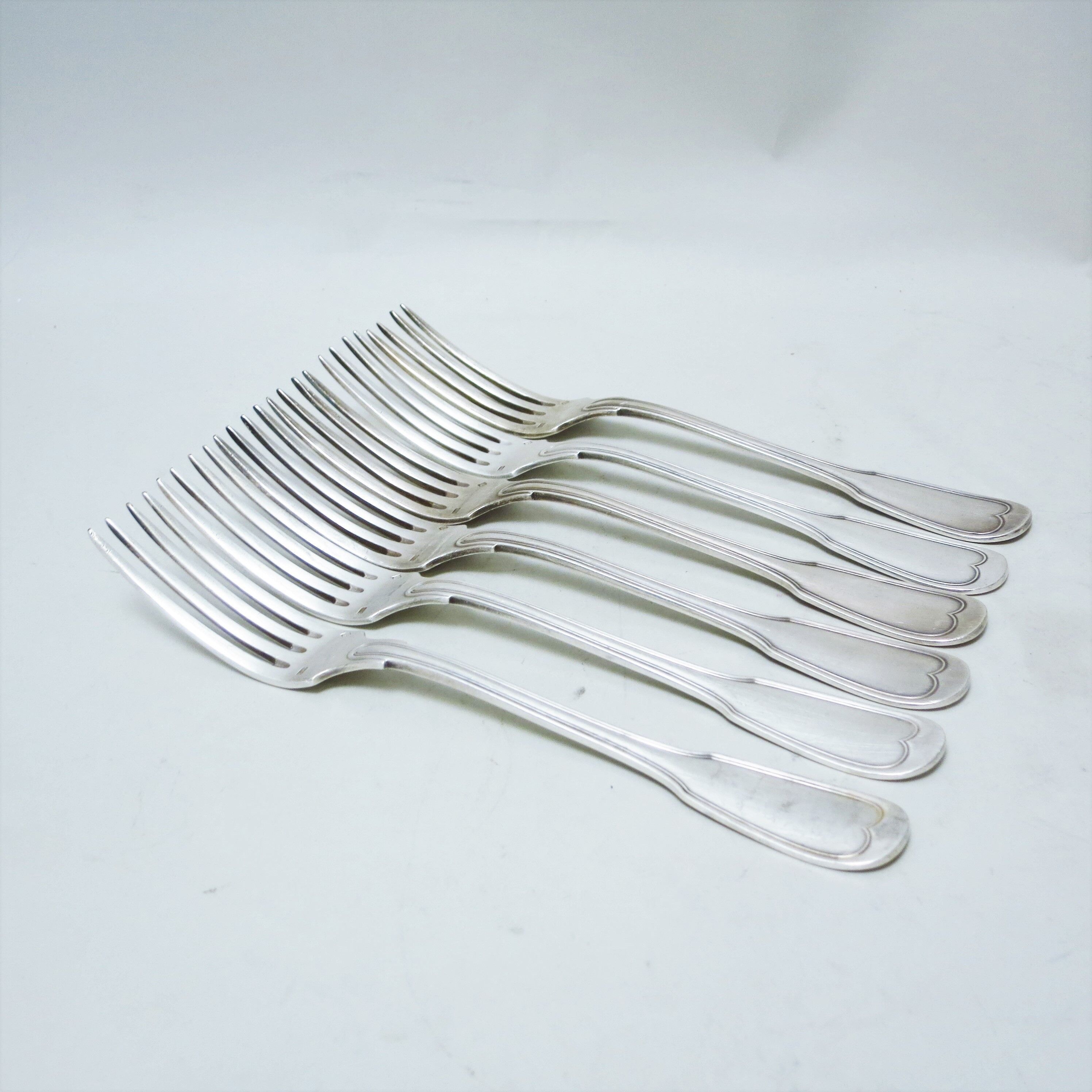 Set of six forks in silver metal mesh model