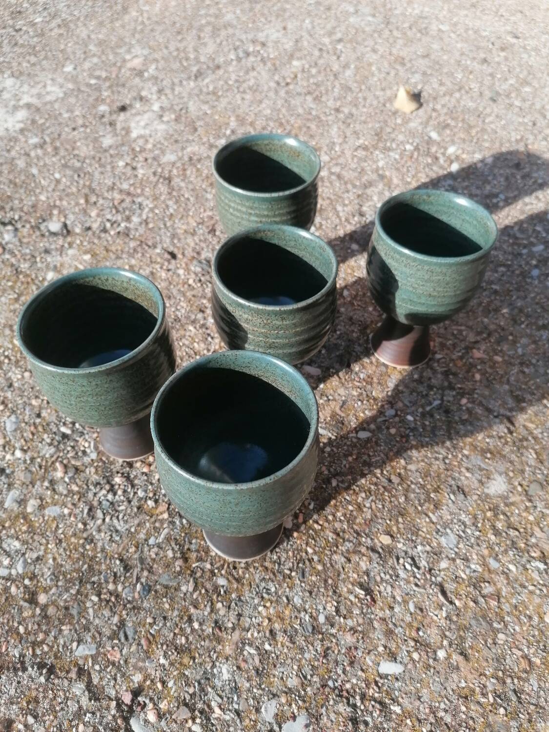 Original signed stoneware tumbler cups.