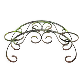 Wrought iron and arabesque plant holder