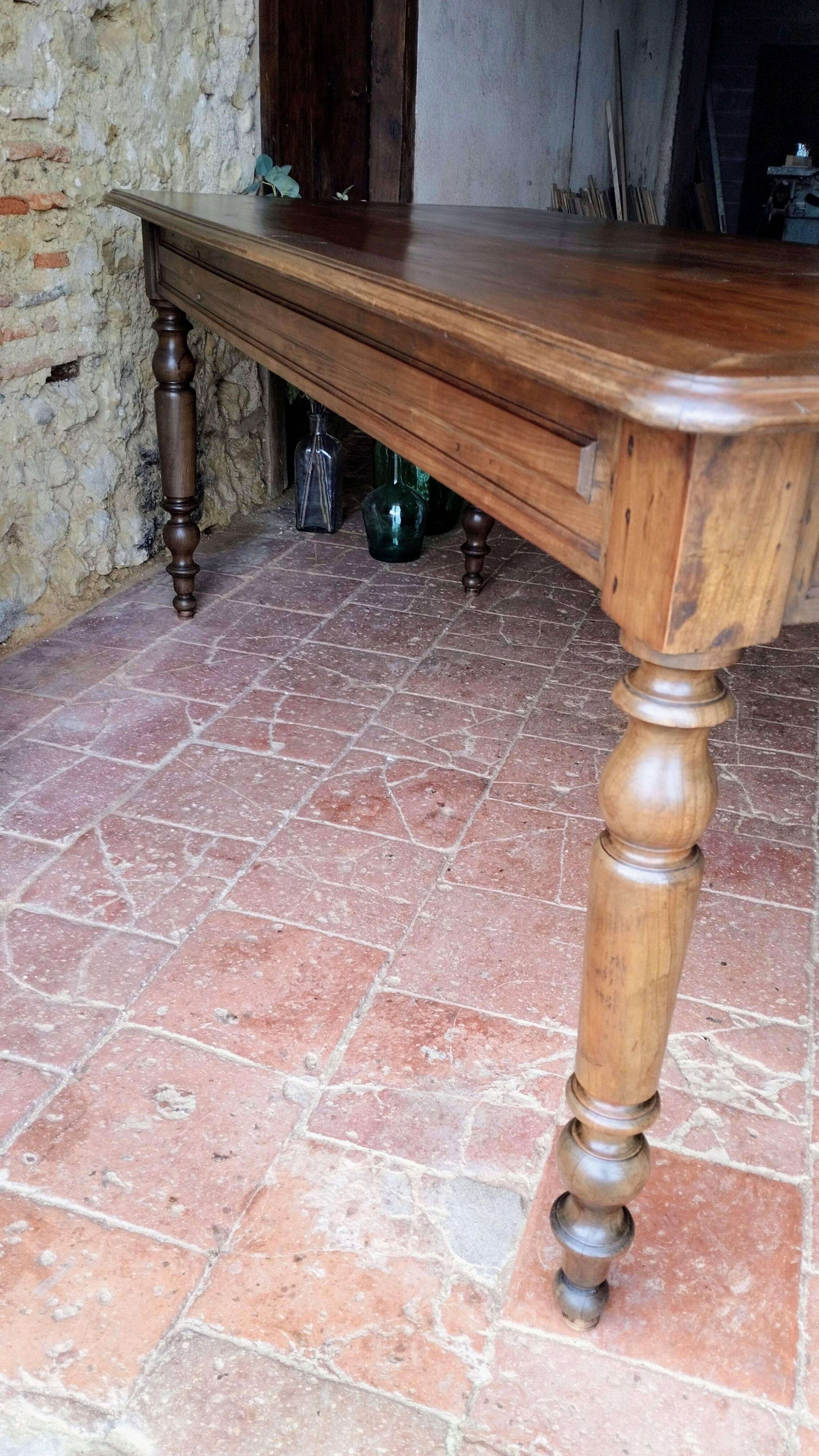 Old French farmhouse table in walnut, turned legs, waxed finish
