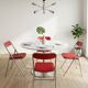 4 vintage folding chairs in red faux leather Plichaise, 1970s