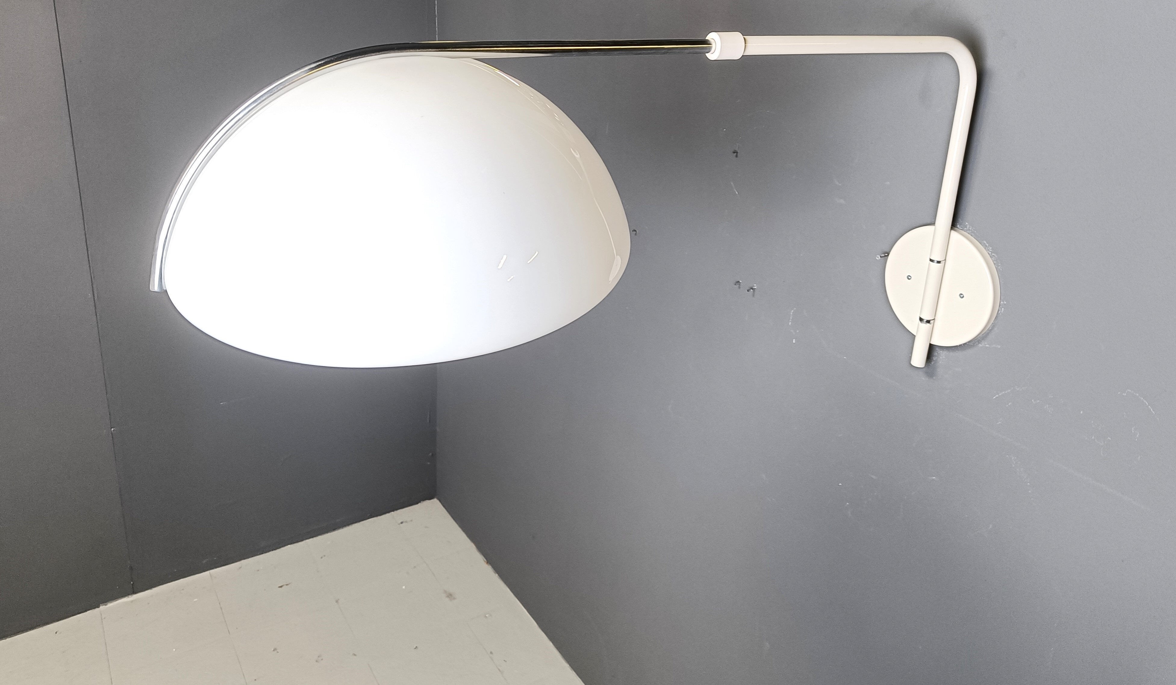 Vintage wall lamp by Luigi Massoni for Guzzini, 1970s