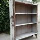 Old white shelf in weathered pine