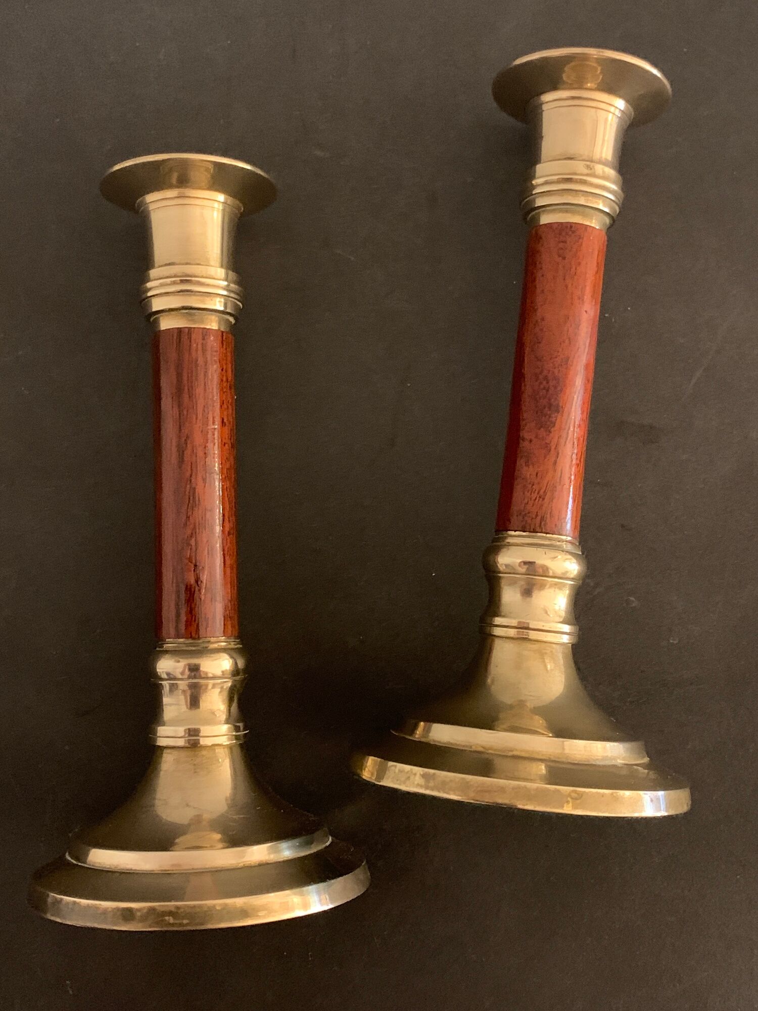 Pair of brass and mahogany wood candle holders