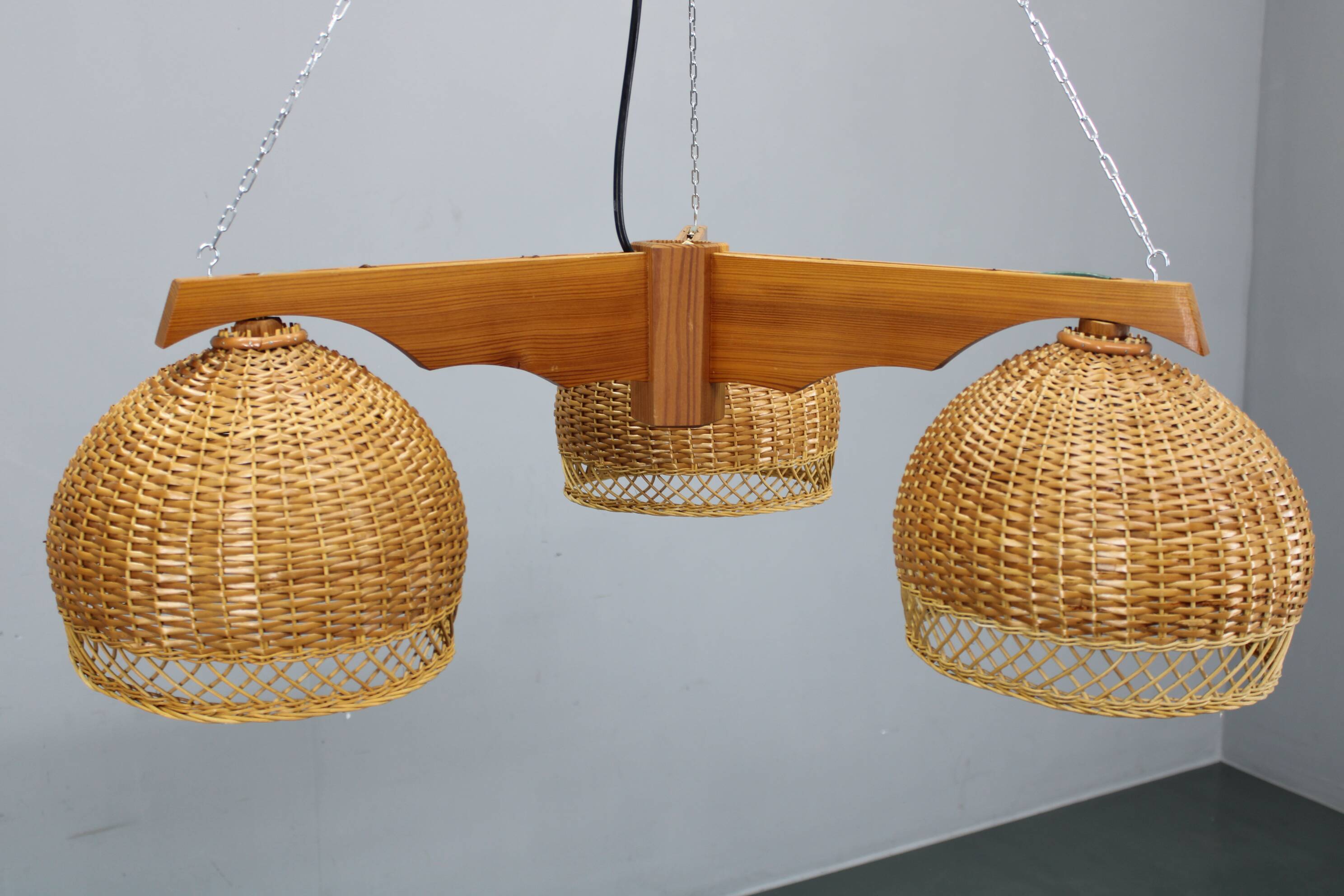 1970s Czechoslovakian rattan & pine pendant light, three-shade chandelier