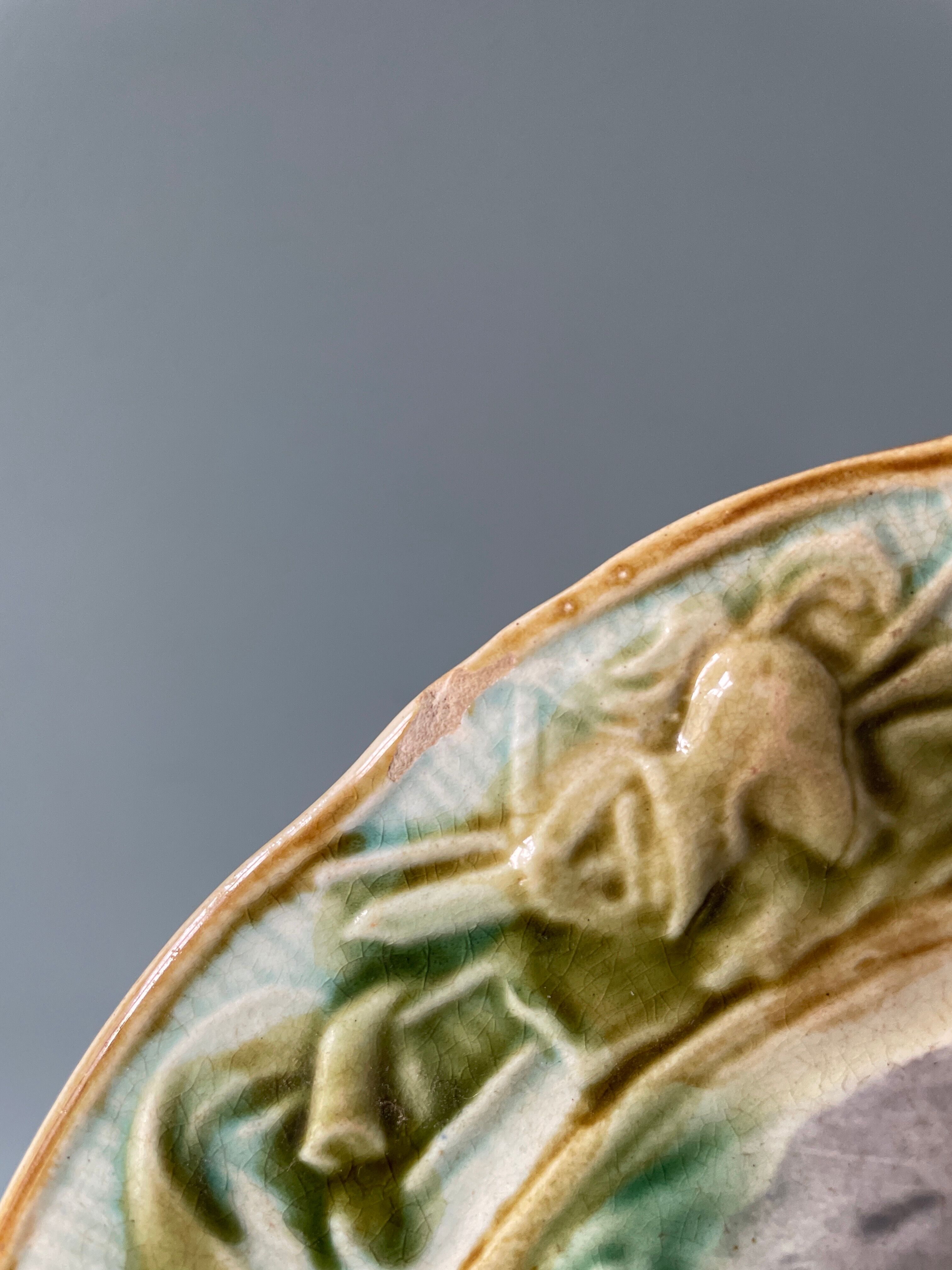 Set of two plates late nineteenth in slip Jeanne d'Arc