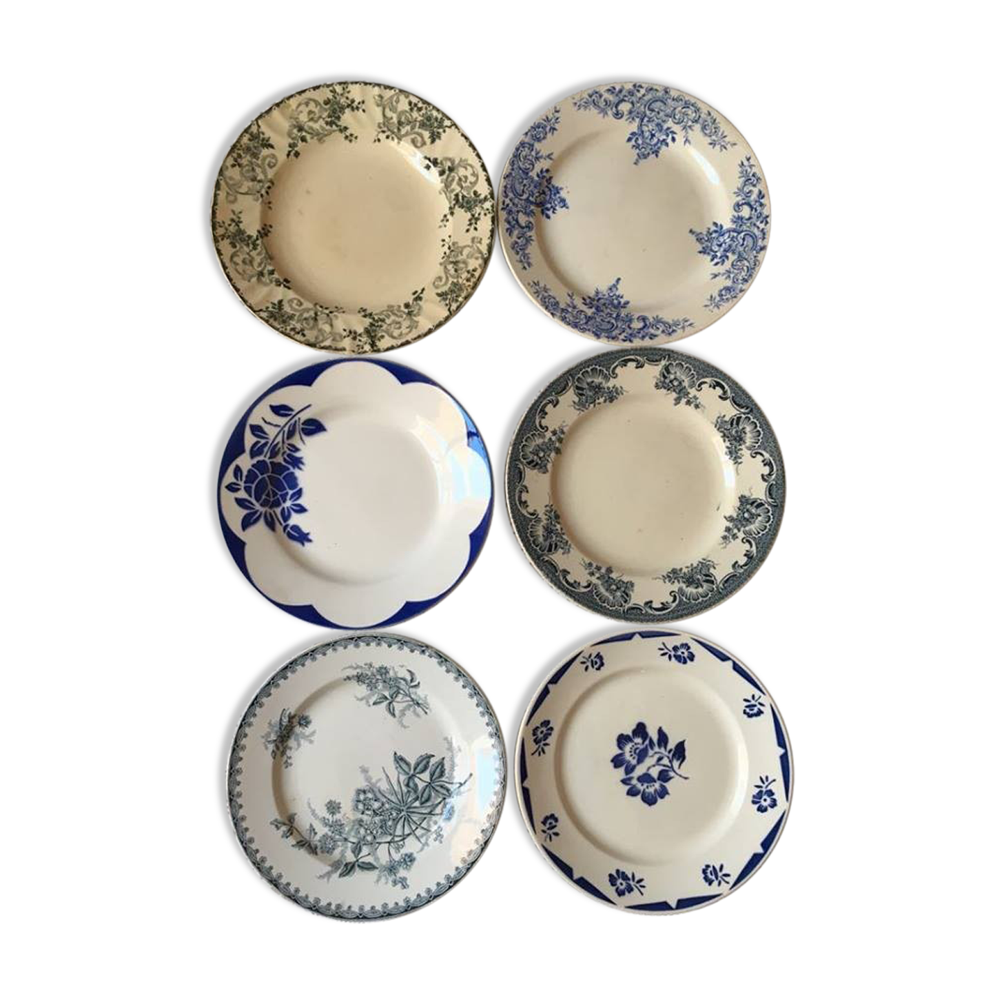 Six flowery old plates in green and blue