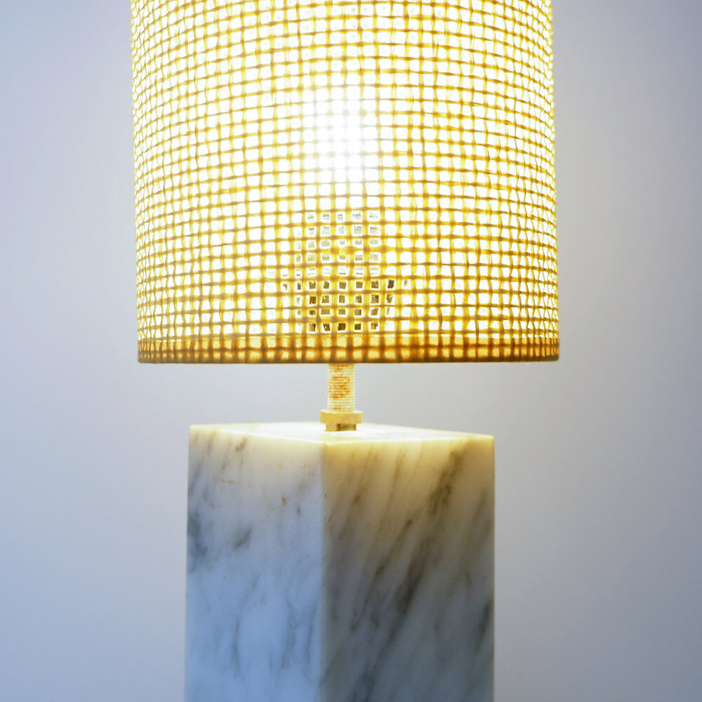Vintage marble table lamp with new raffia shade.