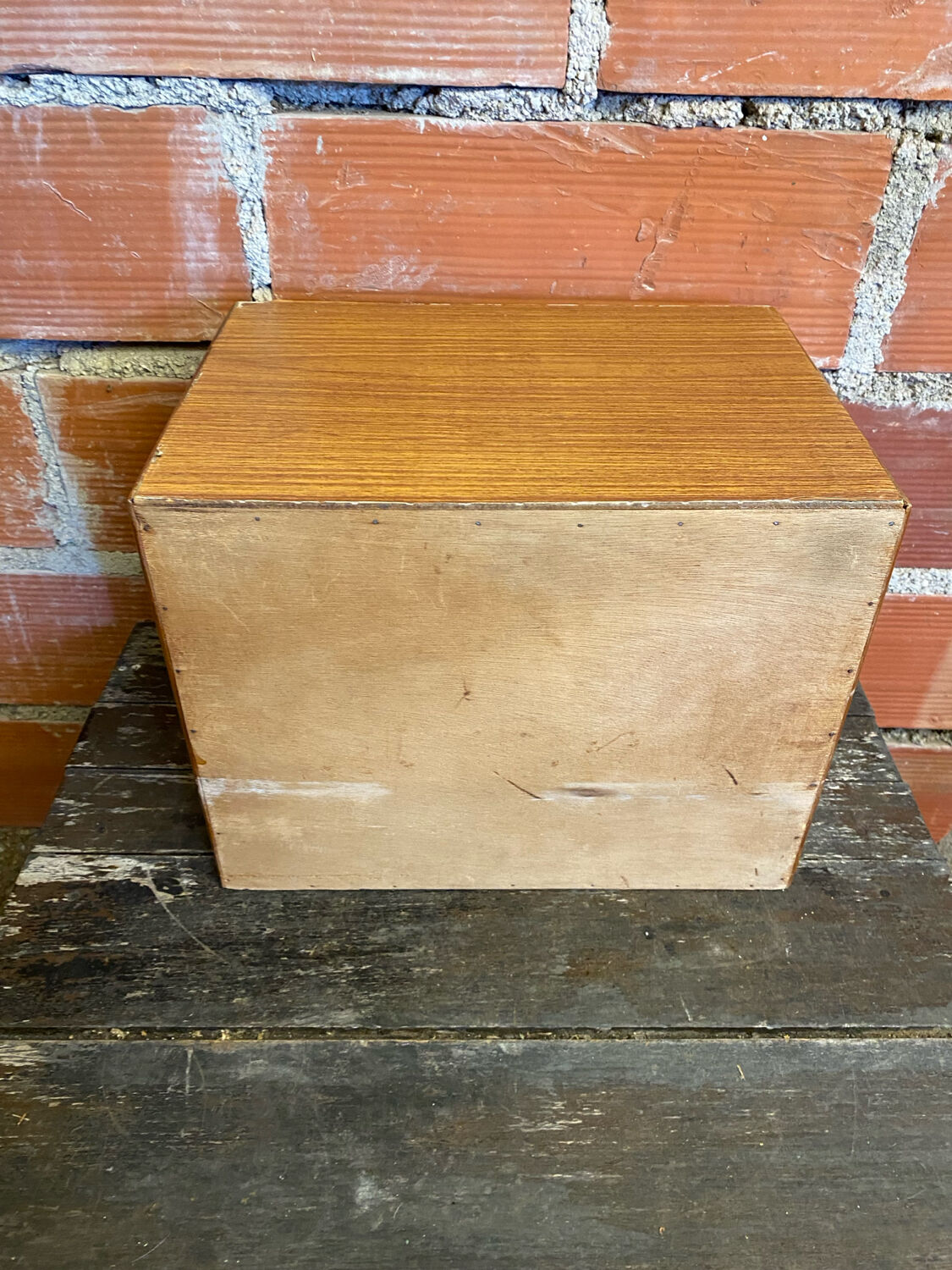 Vintage wooden storage cabinet with shelves