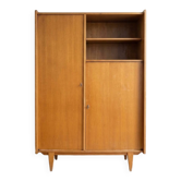 Vintage 1960s wooden wardrobe with tapered legs.