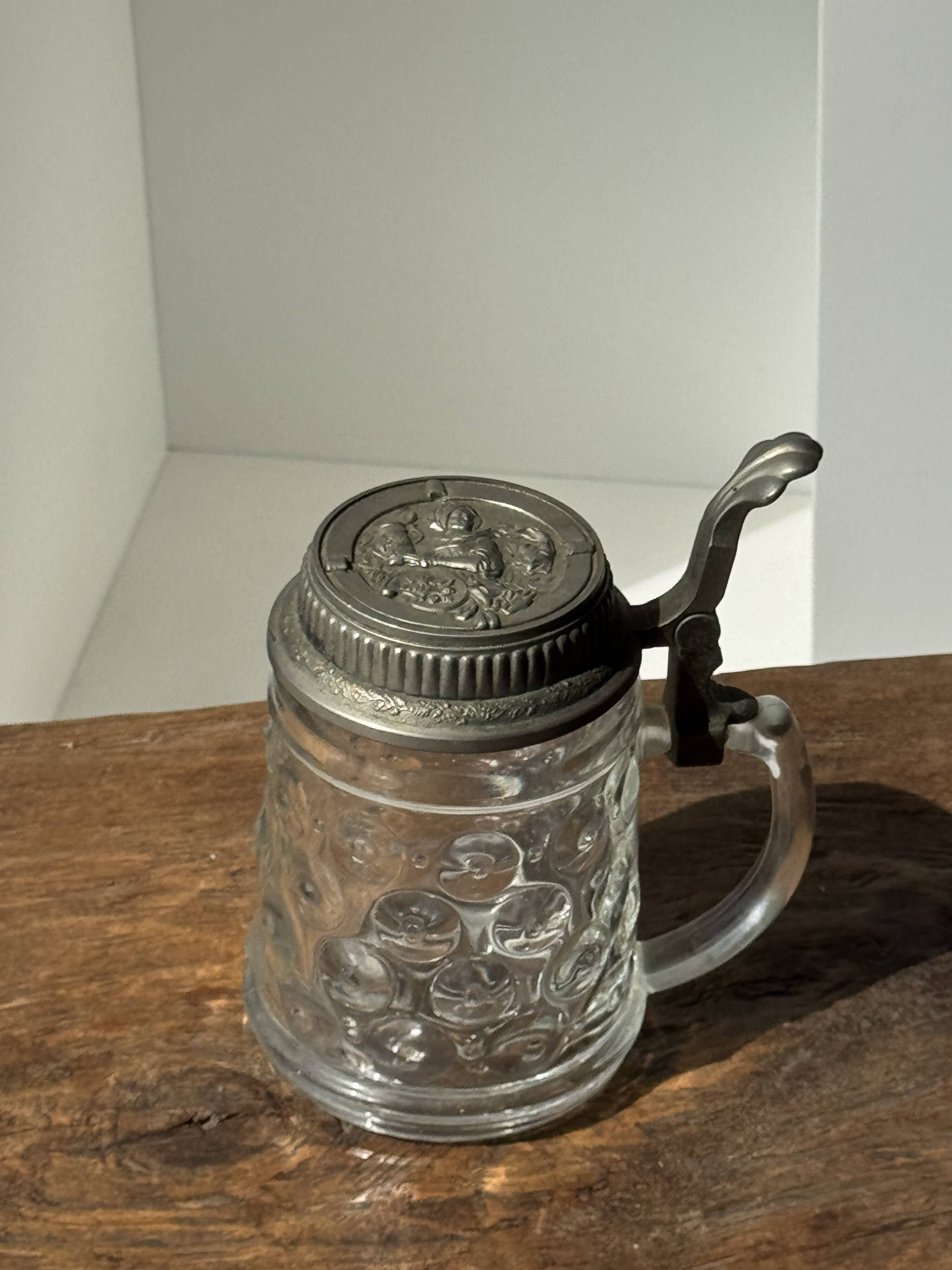 Alsatian beer mug with figurative pewter lid