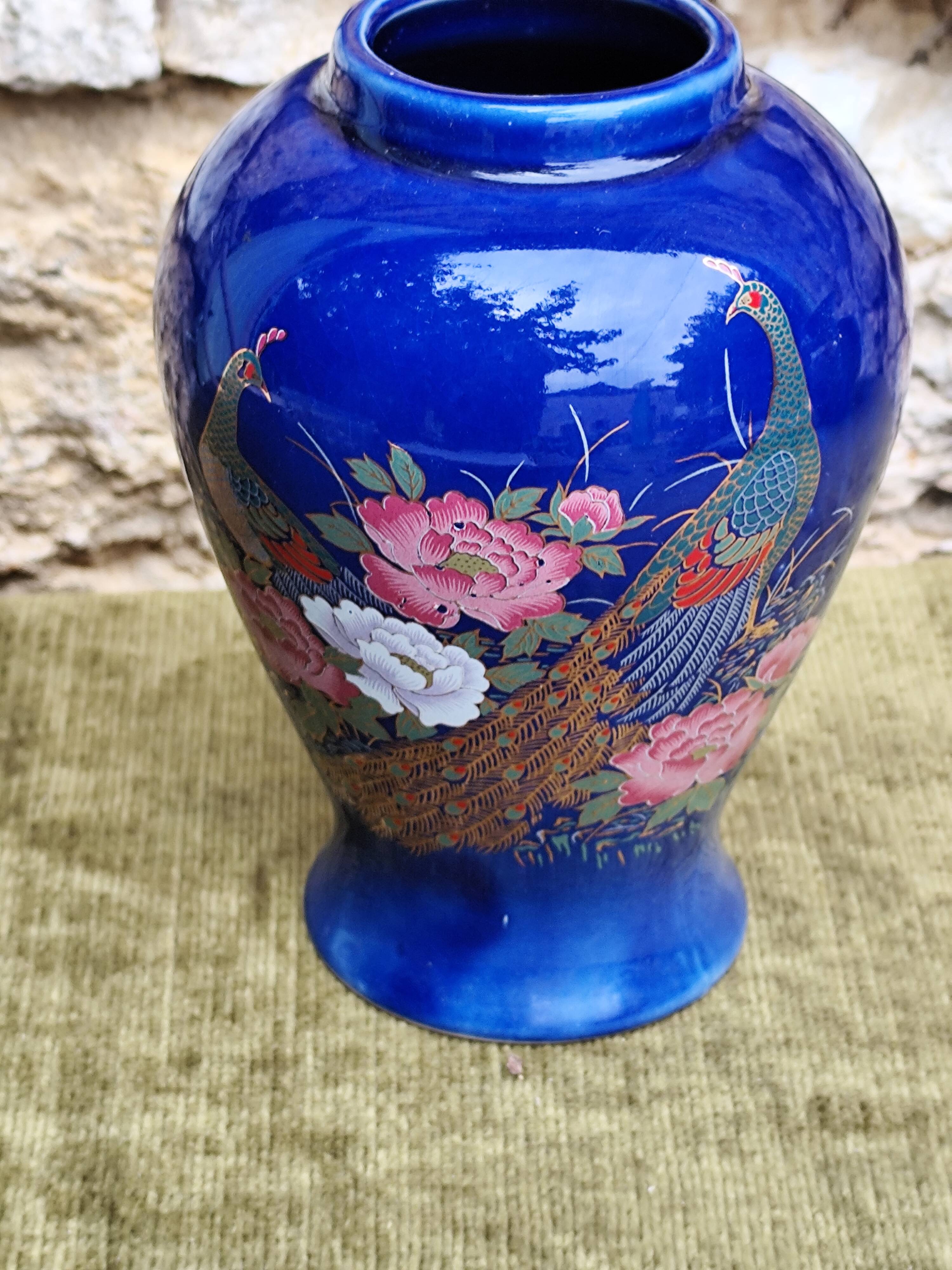Peacock ceramic vase