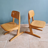 Pair of children's chairs by Casala in solid beech, 1960s.