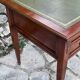 Elegant Louis XVI style mahogany flat desk from the 20th century