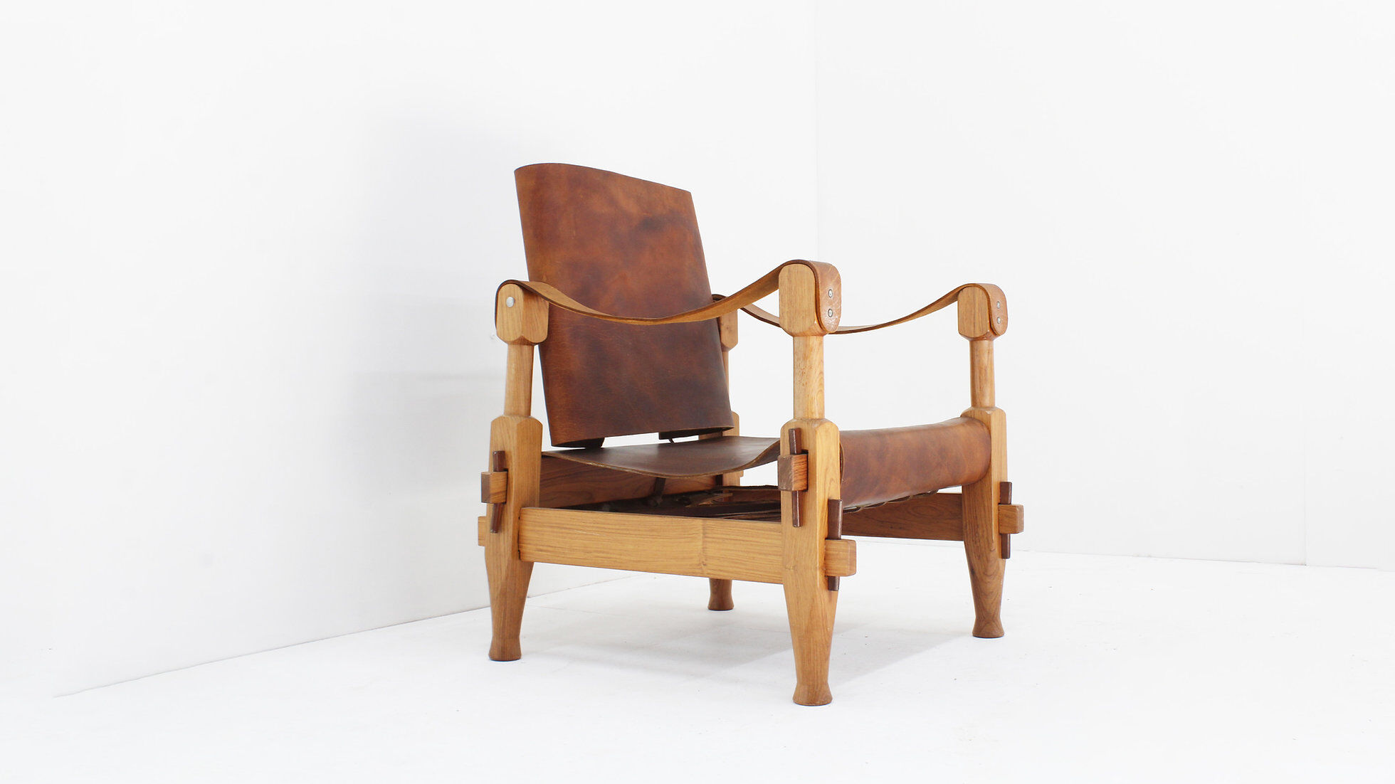 Vintage brutalist wood and cognac leather safari armchair, 1960s