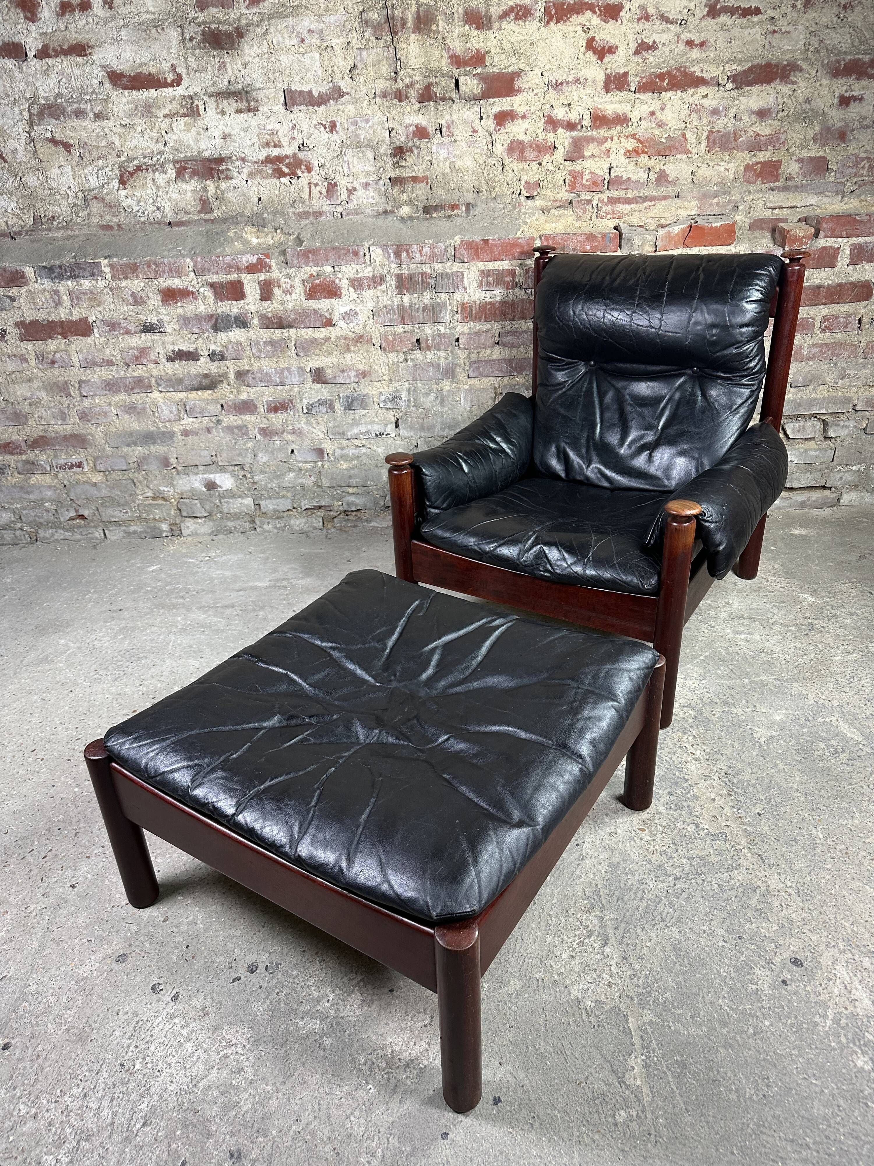 Admiral armchair and its ottoman by Erik Merthen Sweden vintage 1960