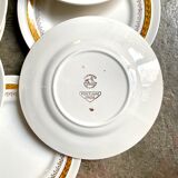 8 assiettes à dessert St Amand en faïence jaune et dorée