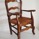 Children's armchair in solid wood with its mulched seat