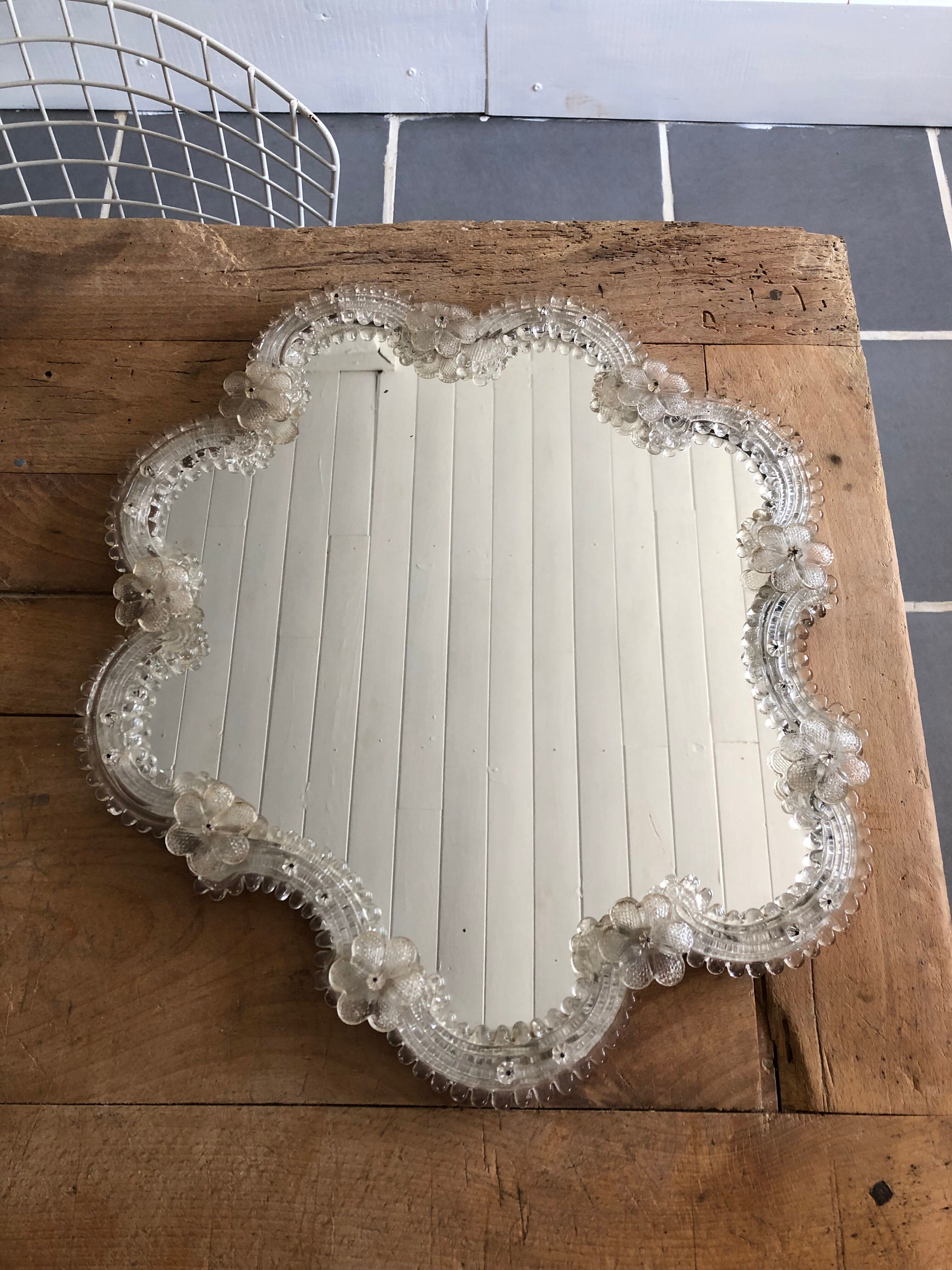 Venetian mirror with glass frieze in the early 20th