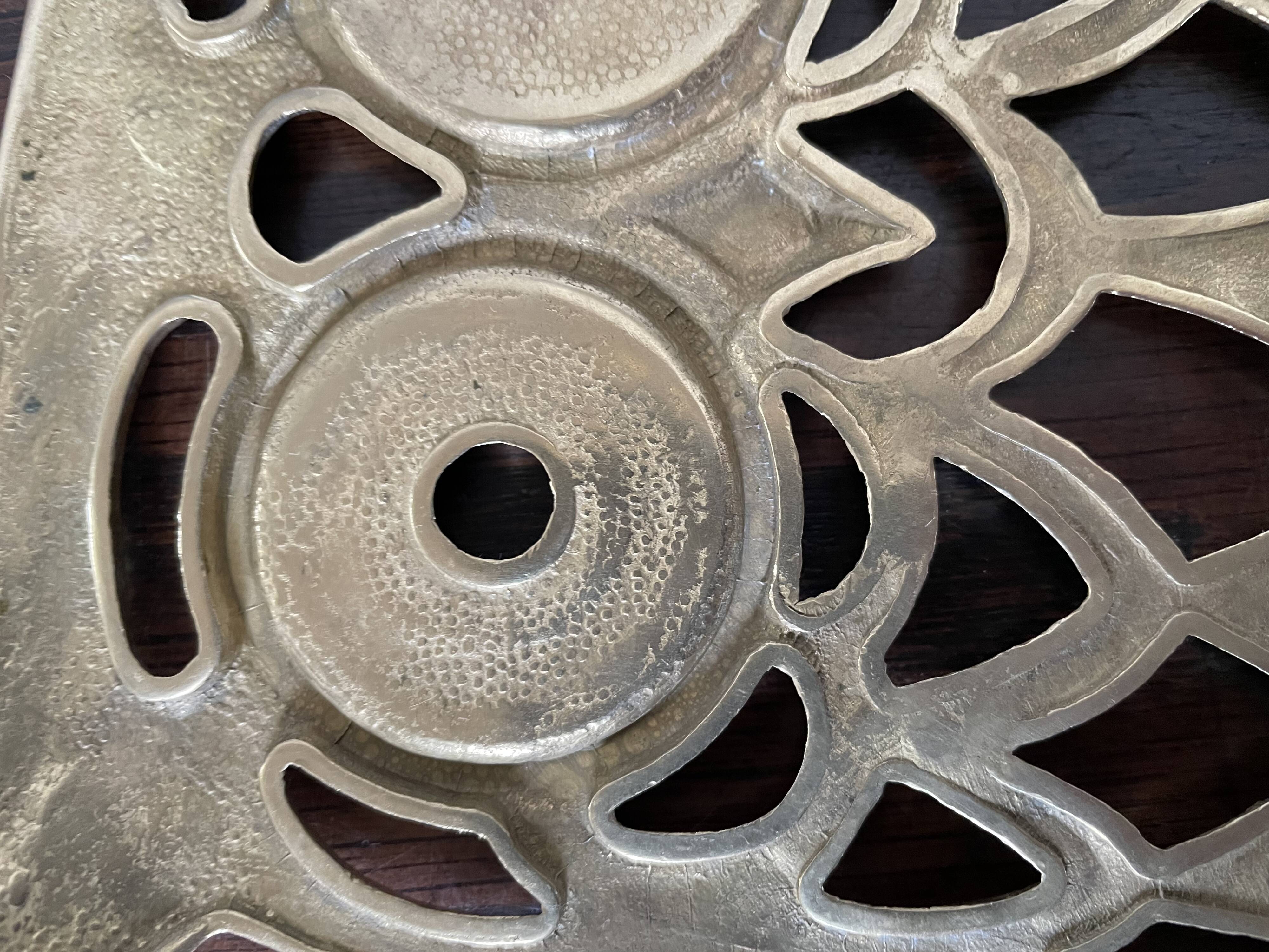 Owl trivet in golden brass