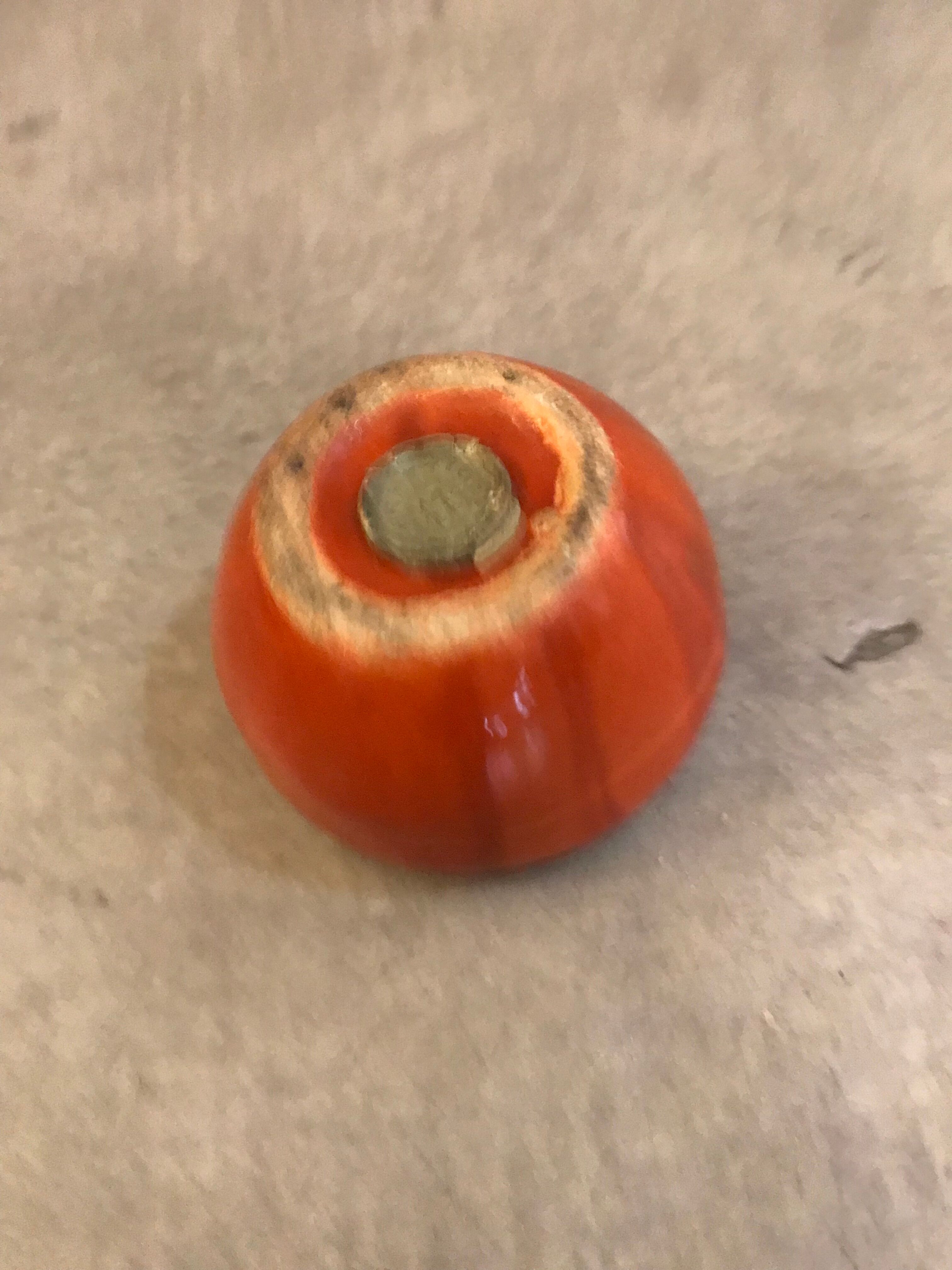 Vintage salt shaker in the shape of an orange marked ermetic