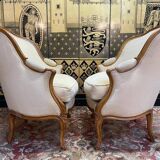 Paire de fauteuils bergères gondoles de style Louis XV