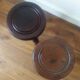 2 round tripod stools