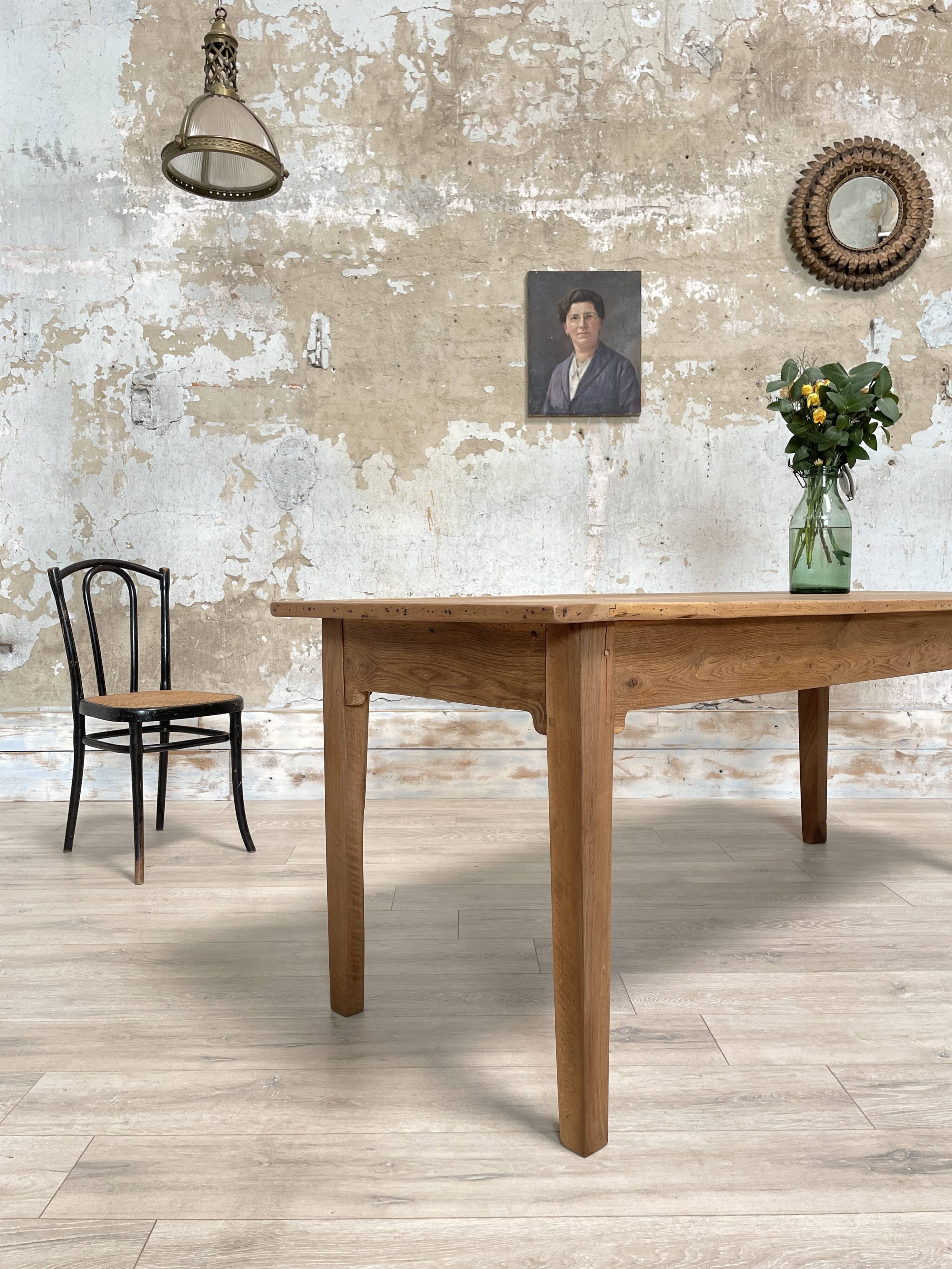 Vintage farmhouse table with spindle legs.