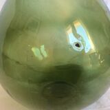 Former "lady jeanne" in blown glass, green bottle