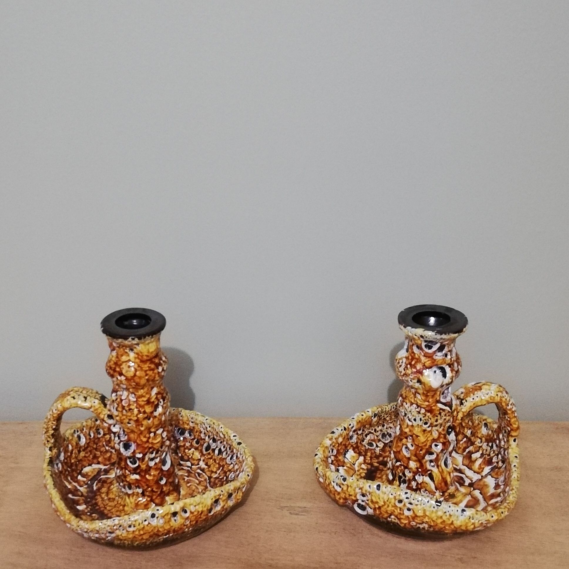 Pair of honey-colored Fat Lava ceramic candle holders