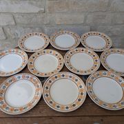 10 dessert plates Saint Amand Amandinoise frilled with orange and black flowers.